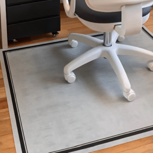 Alfombra vinílica con diseño que simula cemento alisado.